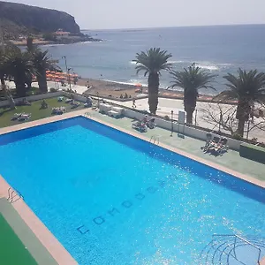 Comodoro Лос Кристианос